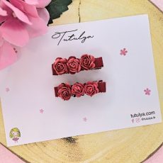 Red flower barrettes