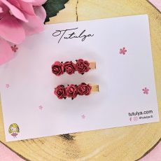 Red flower barrettes