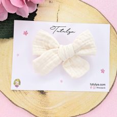 Cream muslin bows
